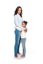 full length view of happy african american mother and daughter hugging and smiling at camera Royalty Free Stock Photo