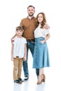 full length view of happy family with one child standing together and smiling at camera Royalty Free Stock Photo