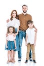 full length view of happy family with two kids standing together and smiling at camera Royalty Free Stock Photo