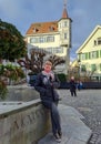 Full length view of a mature woman on a square in St. Gallen