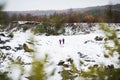 A senior couple jogging in snowy winter nature. Royalty Free Stock Photo