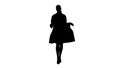 Silhouette Attractive female doctor walking and taking off her w