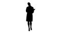 Silhouette Expressive young female doctor with creative idea holding notebook and walking.