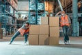 warehouse workers moving boxes Royalty Free Stock Photo