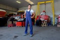 Full length view young male fire station mechanic