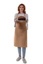 Full length of woman in apron holding a spelt sourdough homemade bread, isolated on white background