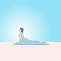 Full-length woman in green and pale violet activewear practising yoga asana and doing Urdhva Mukha Svanasana Upward Facing Dog Royalty Free Stock Photo