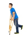 Full length of young asian man on crutches. Royalty Free Stock Photo