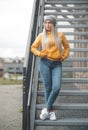 Full length young beautiful woman standing. Outdoors daylight. Pretty girl wearing casual clothing Royalty Free Stock Photo