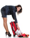 Full length young business woman to late red travel bag Royalty Free Stock Photo