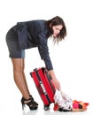 Full length young business woman to late red travel bagd Royalty Free Stock Photo