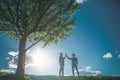 Boy and girl falling in love on meadow Royalty Free Stock Photo