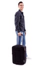 Full length of young man holding his luggage Royalty Free Stock Photo