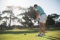 Full length of young man playing golf Royalty Free Stock Photo