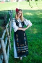 Full length of young woman with red flower in her hair Royalty Free Stock Photo