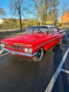Full low front view of a red 1959 Chevrolet Impala, parked Royalty Free Stock Photo