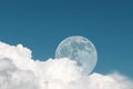 Full moon appears during daytime in late afternoon Royalty Free Stock Photo