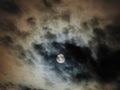 Full moon on a cloudy late summer evening Royalty Free Stock Photo