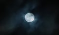 Full moon in cloudy skies Royalty Free Stock Photo