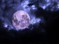 Full moon with dark cloudy sky with copy space on the right side. Royalty Free Stock Photo