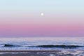 Full moon during dawn at the beach in the South of Spain Royalty Free Stock Photo