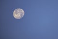 Full moon in daylight On the bright sky Royalty Free Stock Photo