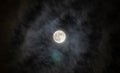 Full moon with fog and cloudy. The moon was not furnished. The night sky and a full moon in the clouds Royalty Free Stock Photo