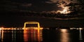 Full moon lights clouds over the iconic Duluth Minnesota aerial lift bridge Royalty Free Stock Photo