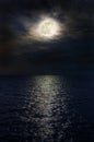 Full moon at night over the sea Royalty Free Stock Photo