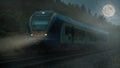 A full moon night. A regional train races through the fog. A night in Germany. Royalty Free Stock Photo