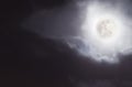 Full moon in night sky with clouds. Royalty Free Stock Photo