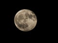 Full moon in the dark night sky in the Midwest