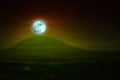 Full moon night sky over hill and mountain and silhouette birds flying Royalty Free Stock Photo