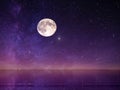 Full moon on night starry sky at sea lilac pink sunset sky stars summer sea dark blue water reflection moonlight galaxy background Royalty Free Stock Photo