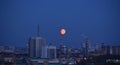 Moon over the city, night sky Royalty Free Stock Photo