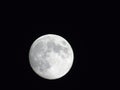 Full moon over the city of Genova by night with a great clear sky