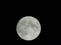 Full moon over the city of Genova by night with a great clear sky