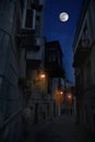 Full moon over the city at night  Baku Azerbaijan. Big full moon shining bright over buildings Royalty Free Stock Photo