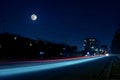 Full moon over the city at night, Baku Azerbaijan. Big full moon shining bright over skyscrapers Royalty Free Stock Photo