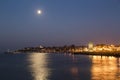 Full moon over the coastal city Royalty Free Stock Photo