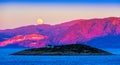 Full moon over Crete at sunset Royalty Free Stock Photo