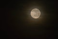 Full moon over dark black sky. Night with clouds. Royalty Free Stock Photo