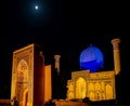 Full moon over Gur-e Amir mausoleum of Timur at night - Samarkand, Uzbekistan Royalty Free Stock Photo