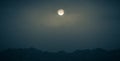 Full moon over mountains in Scotland Royalty Free Stock Photo
