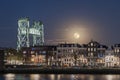Full moon over North island in Rotterdam with the historic railway bridge Royalty Free Stock Photo