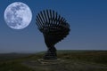 A full moon over the Ringing Singing Tree nearly Burnley in Lancashire