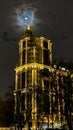 full moon over the spire of the building . the plot of the vampire movie