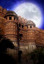 The full Moon over walls of the Red fort. India. Agra. Royalty Free Stock Photo