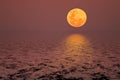 Full moon over water with reflection Royalty Free Stock Photo