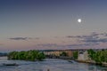 Full moon in the purple sky at Prague with Vltava river scene